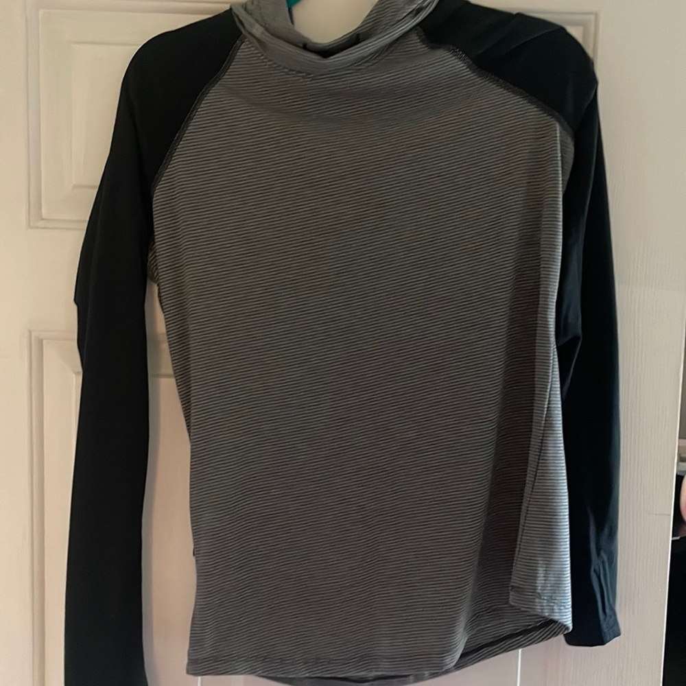 Under armour running hooded top.